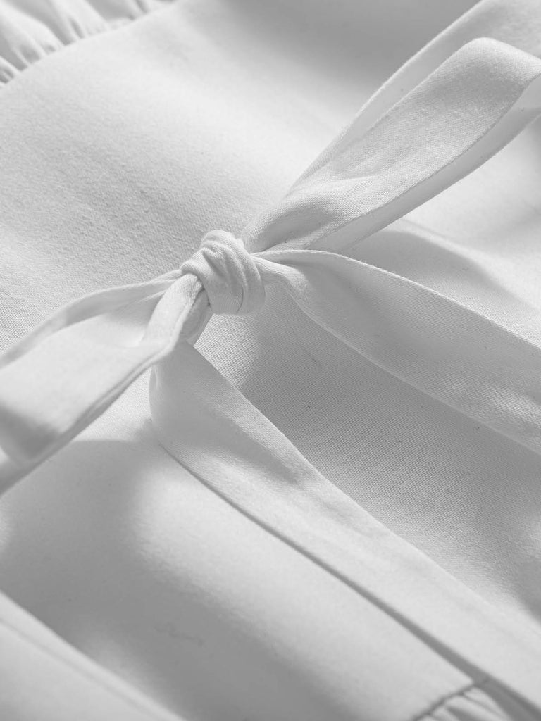 biała bawełniana sukienka midi